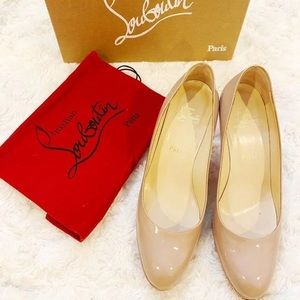 Christian Louboutin Patent Leather Pumps
Prorata